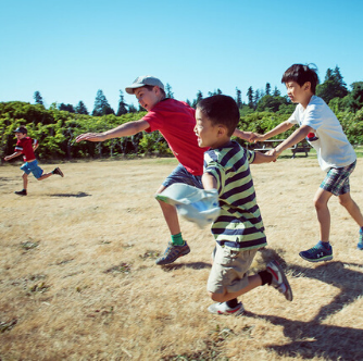 Kids running at UBC farm